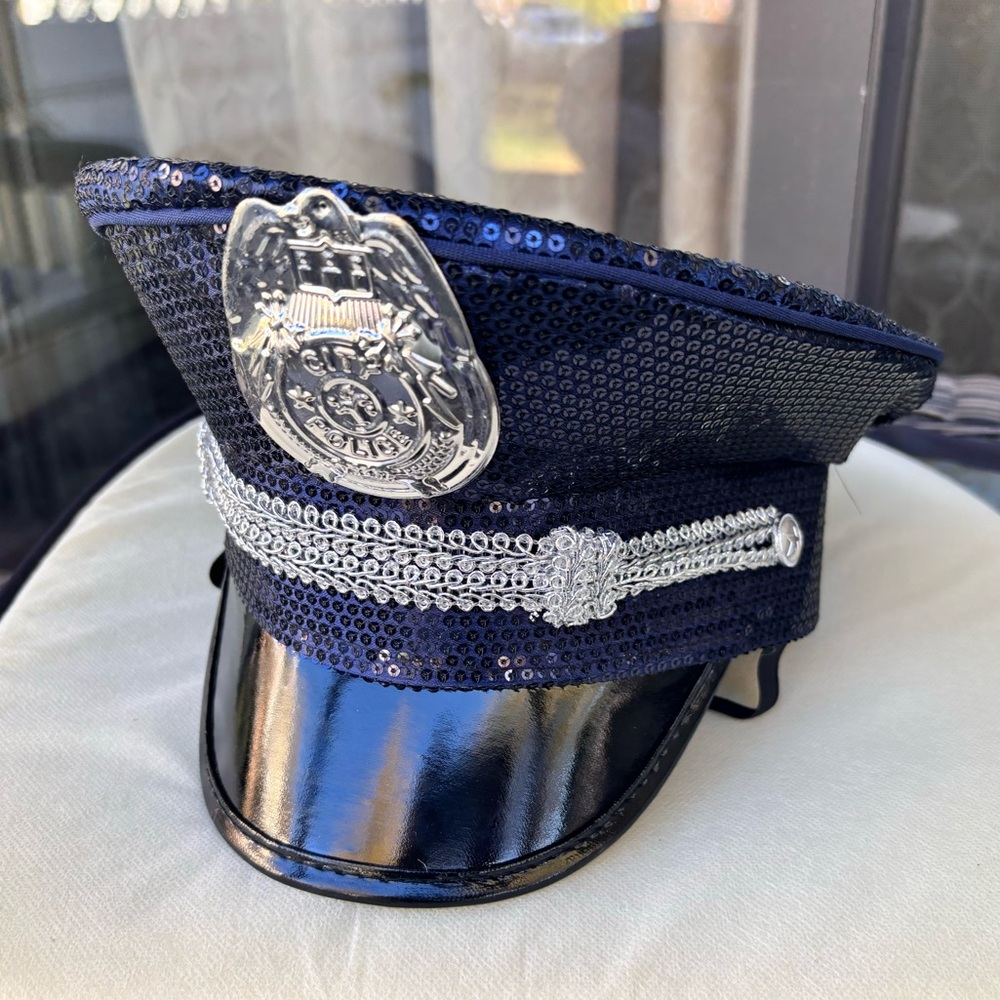 Sequin Halloween or a party police hat. New with tag. One size fits all.